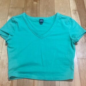 green cropped shirt